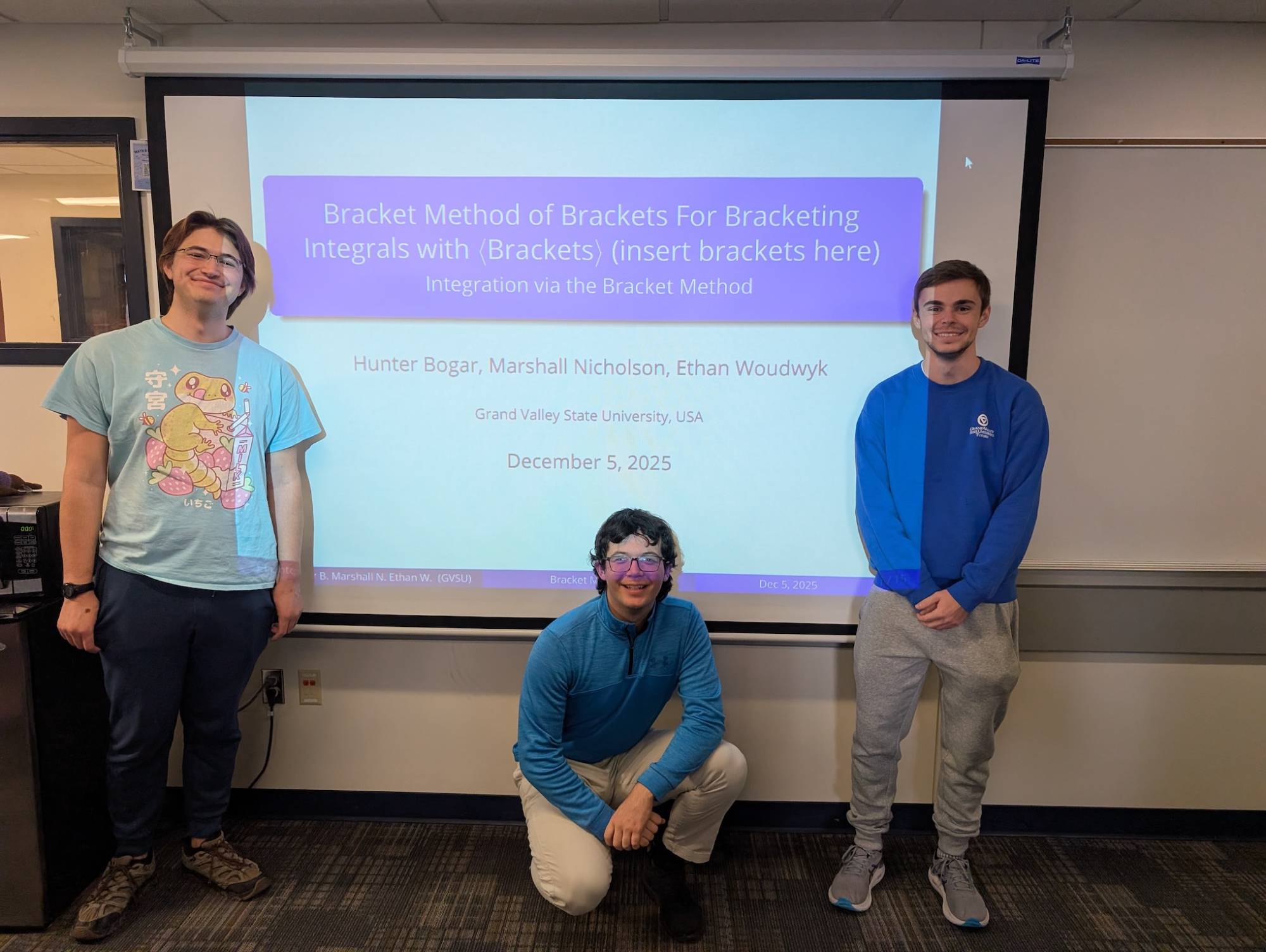 Students in front of a presentation board